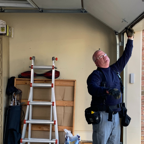 Dealer Inspecting Door